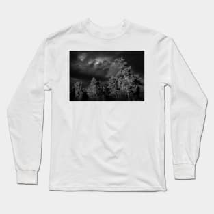 Dramatic clouds in the sky over the dark Swedish forest Long Sleeve T-Shirt